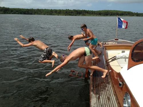 Robinson : balades en pinasse sur le lac de Lacanau
